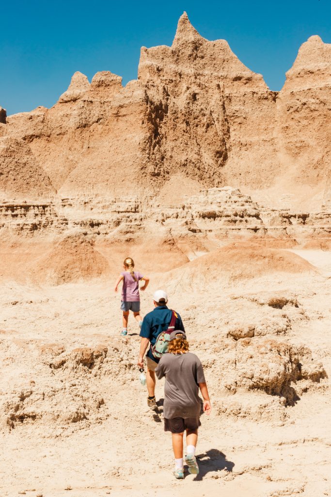 Climbing in the Badlands National Park with kids